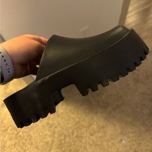 Black lugg sole mules